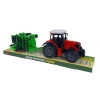 Traktor z maszyną rolniczą 5710